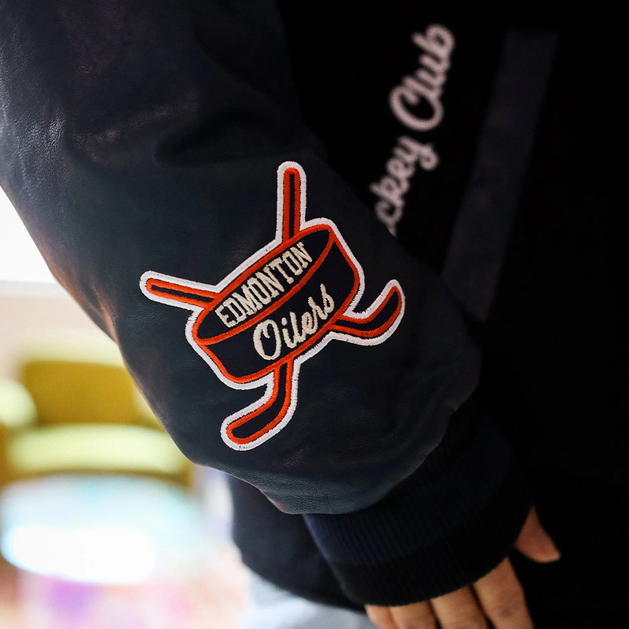 Edmonton Oilers Women's Peace Collective Black & Blue Cropped Varsity Jacket - Image 3